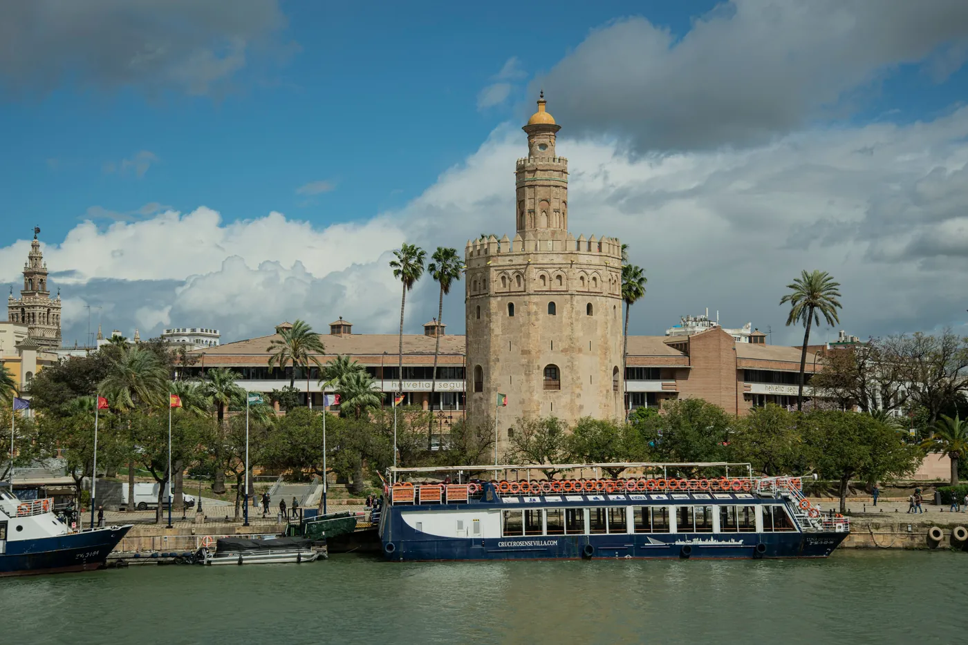 Torre del Oro and Guadalquivir cruise boat at the jetty